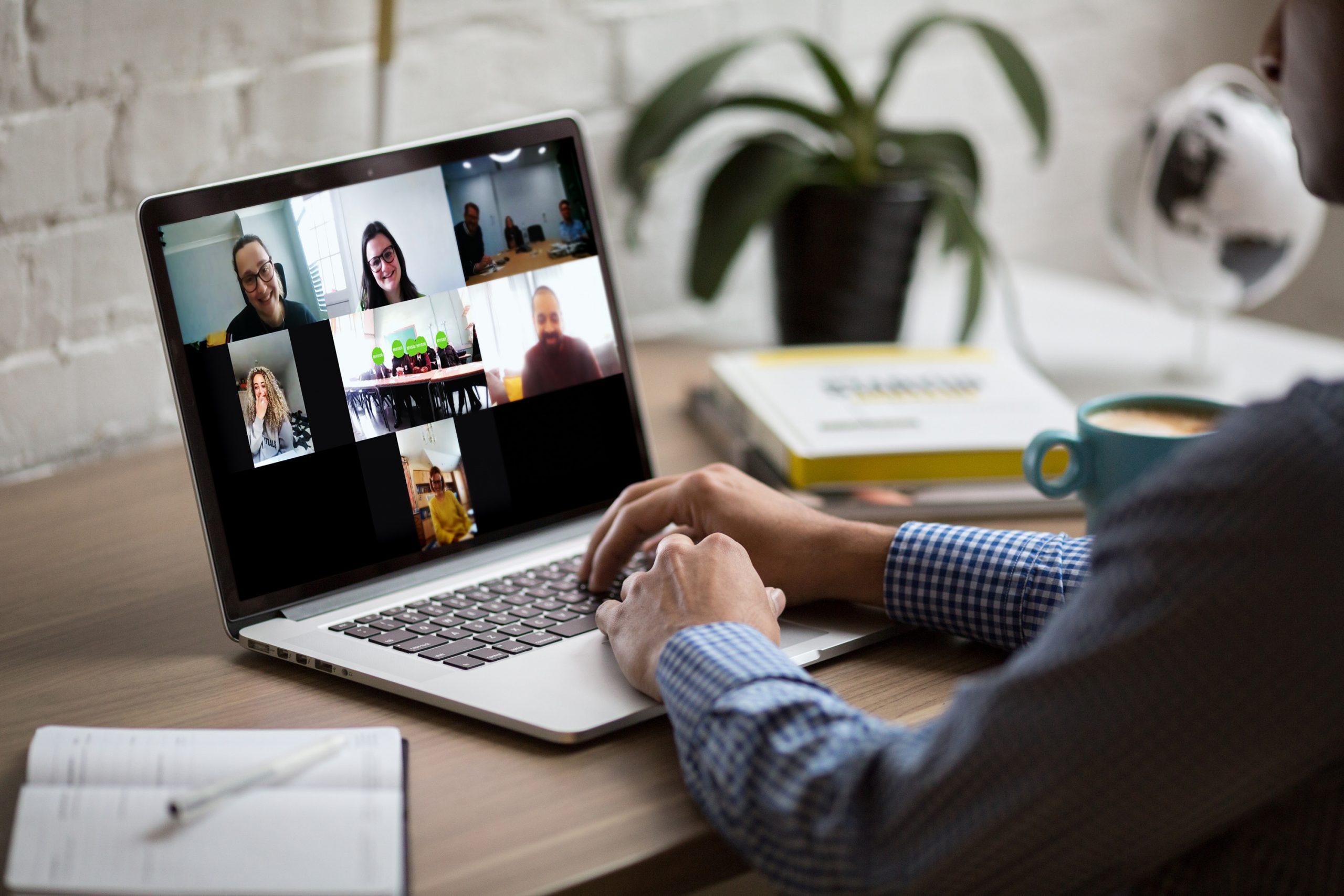 A man participating in a group business call