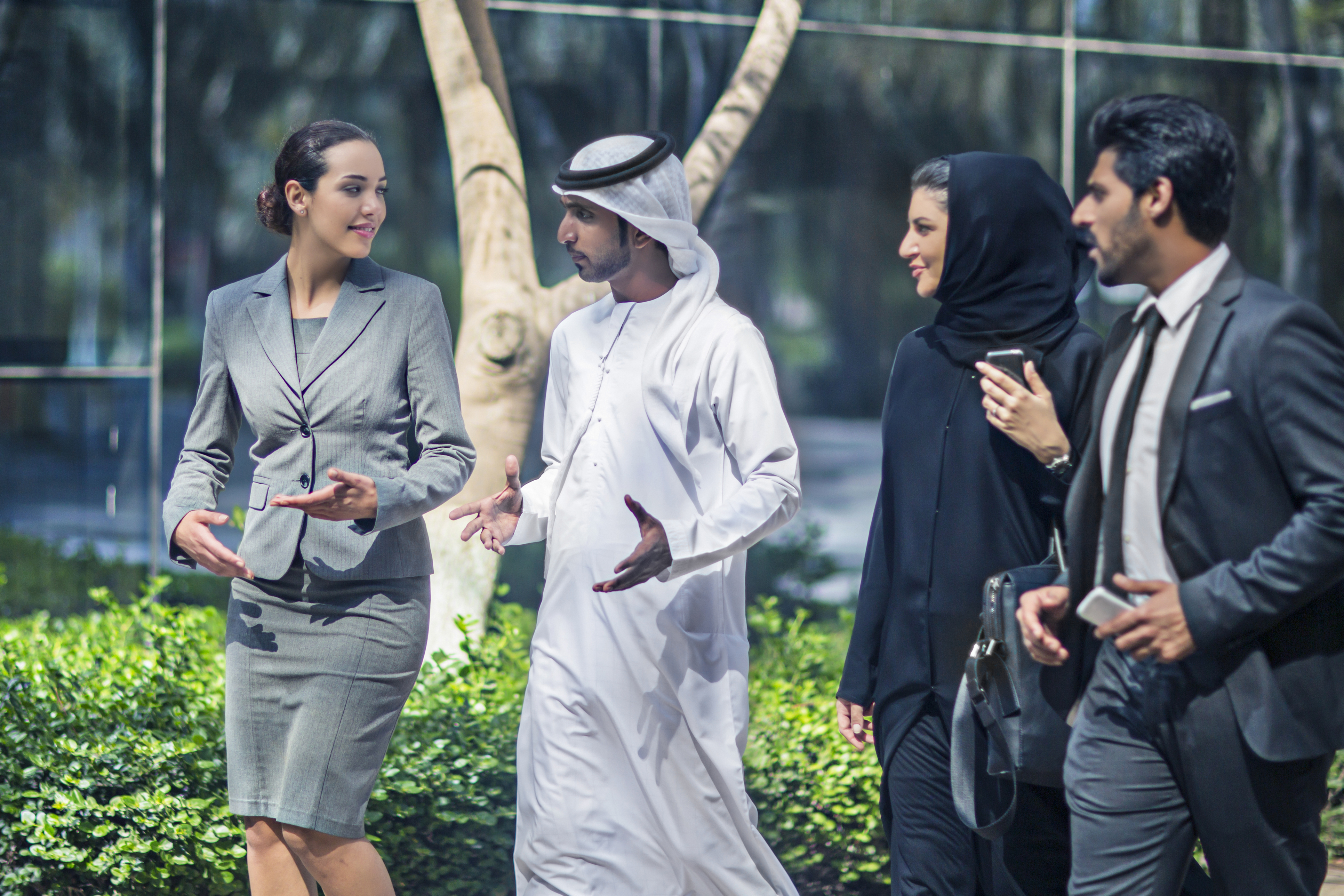 Middle Eastern Business People Talking In The Street